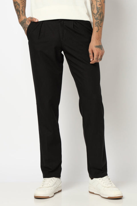 BLACK REALXED FIT TRAVELLER PANTS - Trousers - 250740725