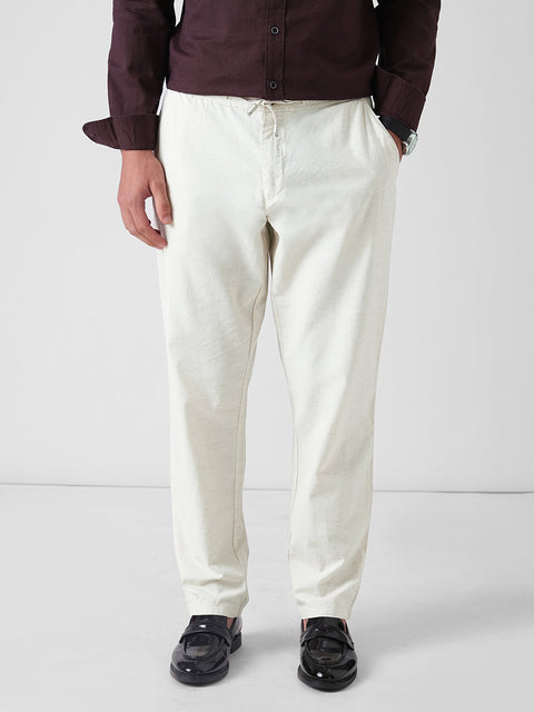 CREAM DOBBY TRAVELLER TROUSERS