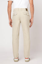BEIGE SLIM TRAVELLER PANTS - Trousers - 251041396