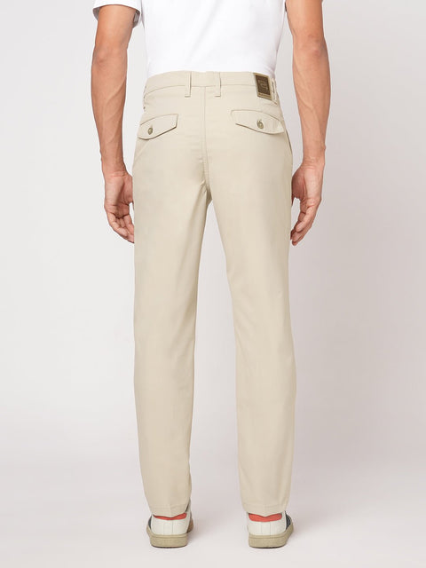 BEIGE SLIM TRAVELLER PANTS - Trousers - 251041396