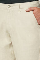 BEIGE SLIM TRAVELLER TROUSER - Trousers - 251141421