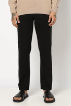 BLACK PLAIN TRAVELLER FIT COTTON TROUSER - Trousers - 250840884