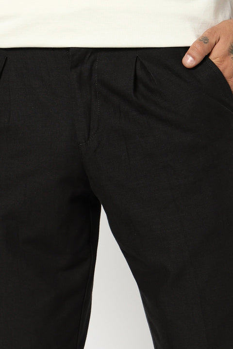 BLACK REALXED FIT TRAVELLER PANTS - Trousers - 250740725