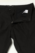 BLACK REALXED FIT TRAVELLER PANTS - Trousers - 250740725