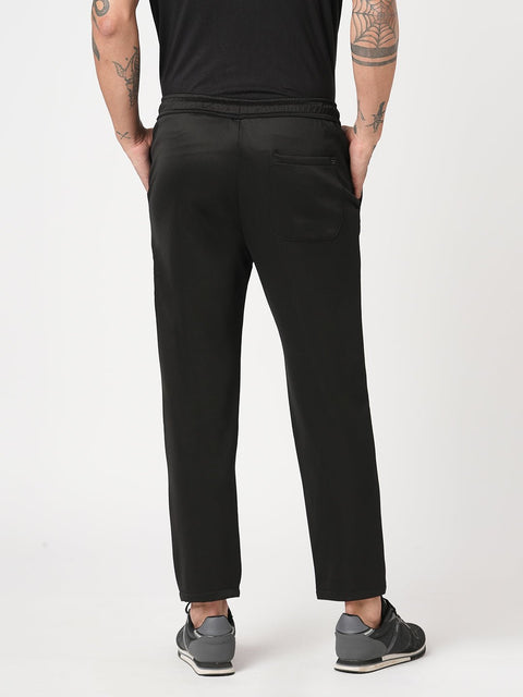 BLACK RELAXED TRAVLLER TROUSER - Trousers - 251141431