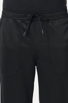 BLACK RELAXED TRAVLLER TROUSER - Trousers - 251141431