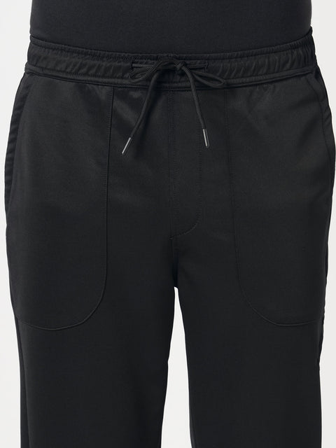 BLACK RELAXED TRAVLLER TROUSER - Trousers - 251141431