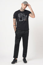 BLACK RELAXED TRAVLLER TROUSER - Trousers - 251141431