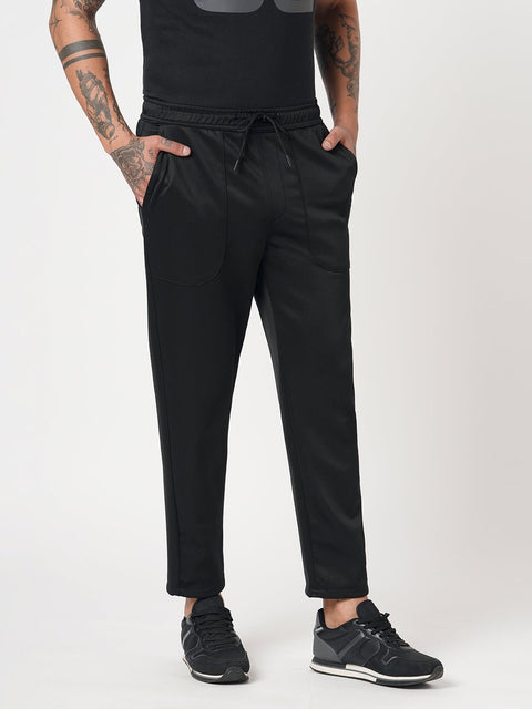 BLACK RELAXED TRAVLLER TROUSER - Trousers - 251141431