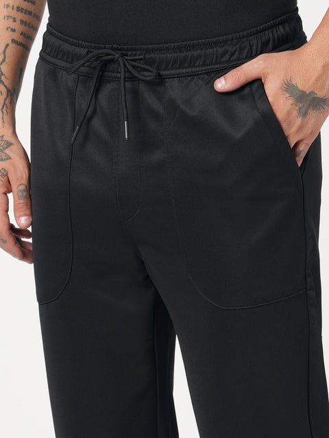 BLACK RELAXED TRAVLLER TROUSER - Trousers - 251141431