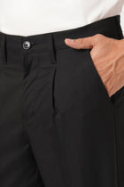 BLACK SLIM FIT TRAVELLER MEN'S PANTS - Trousers - 251041391