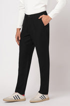 BLACK SLIM FIT TRAVELLER PANTS - Trousers - 251141411