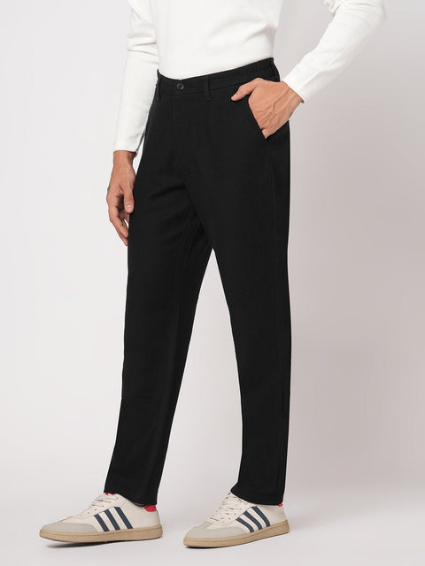 BLACK SLIM FIT TRAVELLER PANTS - Trousers - 251141411