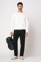 BLACK SLIM FIT TRAVELLER PANTS - Trousers - 251141411