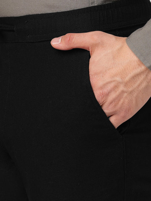BLACK SLIM TRAVELLER PANTS - Trousers - 251241672