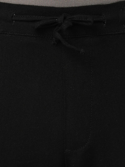 BLACK SLIM TRAVELLER PANTS - Trousers - 251241672