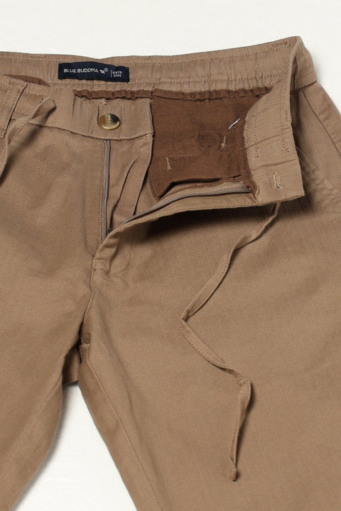 KHAKHI PLAIN TRAVELLER FIT PANTS - Trousers - 250740684