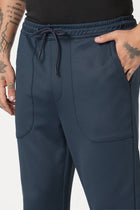 NAVY RELAXED TRAVLLER TROUSER - Trousers - 251141443