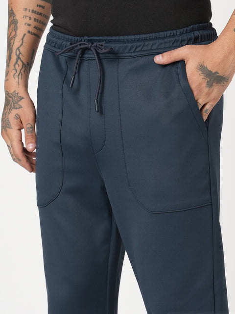 NAVY RELAXED TRAVLLER TROUSER - Trousers - 251141443
