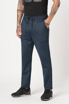 NAVY RELAXED TRAVLLER TROUSER - Trousers - 251141443