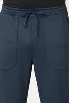 NAVY RELAXED TRAVLLER TROUSER - Trousers - 251141443