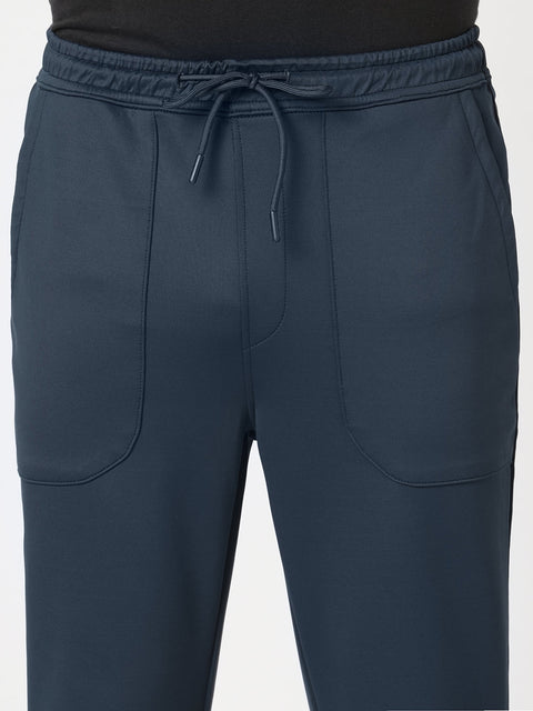 NAVY RELAXED TRAVLLER TROUSER - Trousers - 251141443