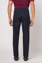 SLIM FIT NAVY TRAVELLER PANTS - Trousers - 251041401