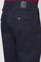 SLIM FIT NAVY TRAVELLER PANTS - Trousers - 251041401