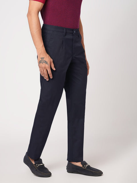 SLIM FIT NAVY TRAVELLER PANTS - Trousers - 251041401