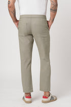 SLIM TRAVELLER RUST DOBBY PANTS - Trousers - 251241662