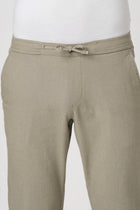 SLIM TRAVELLER RUST DOBBY PANTS - Trousers - 251241662