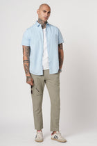 SLIM TRAVELLER RUST DOBBY PANTS - Trousers - 251241662