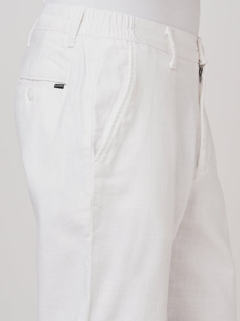 WHITE SLIM FIT TRAVELLER PANTS - Trousers - 251141406