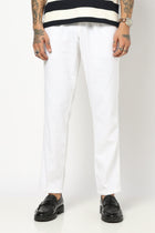 WHITE TRAVELLER FIT LINEN TROUSER - Trousers - 250740745